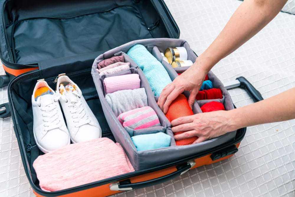 Как упаковать вещи в чемодан?